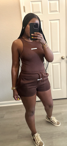 Brown Sleeveless bodysuit and shorts set. Snap closure bodysuit.